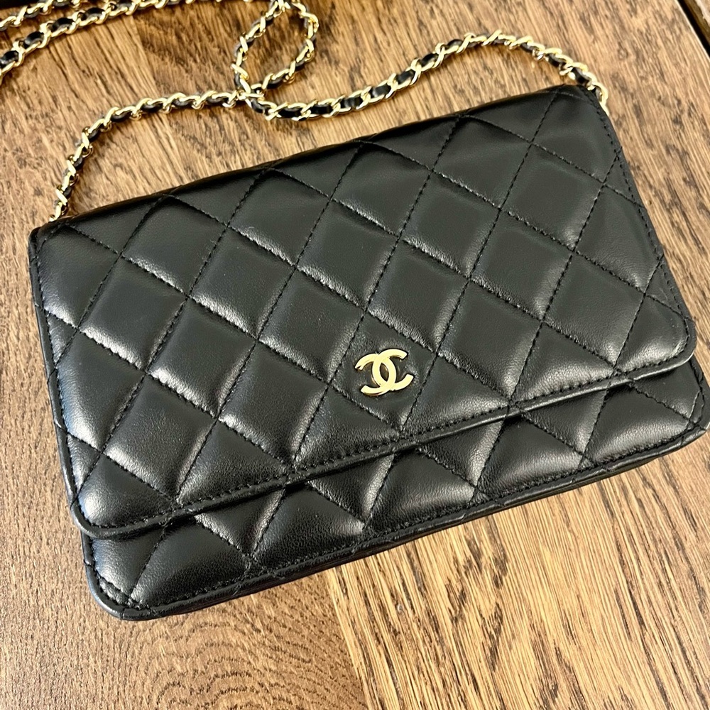 CHANEL Black and Gold Quilted Crossbody Bag